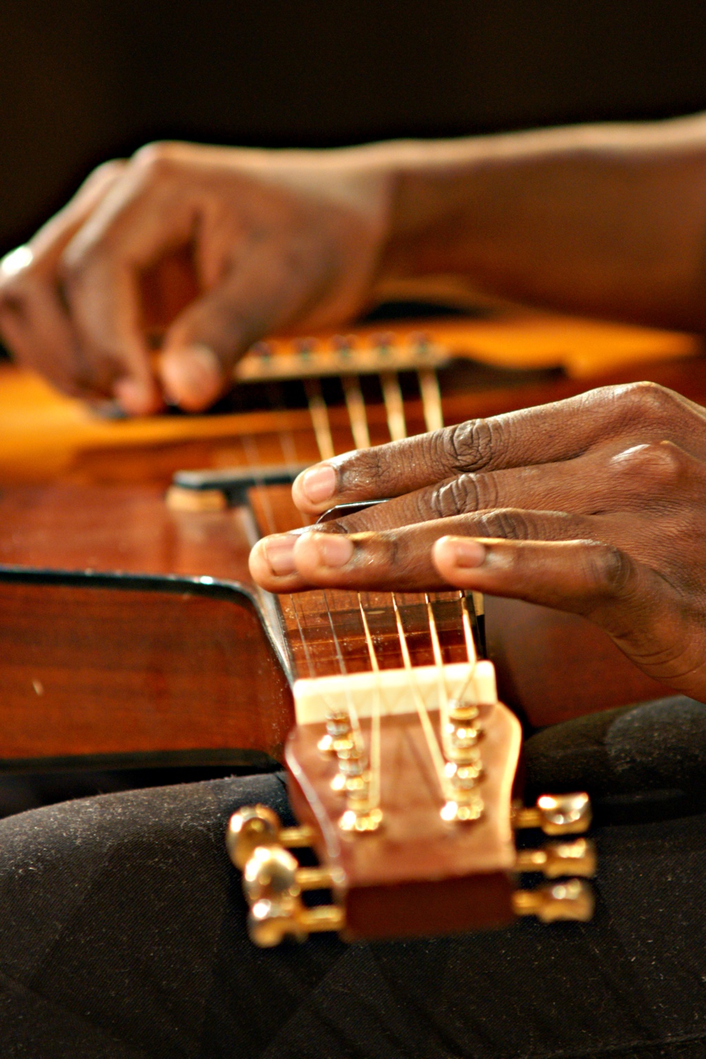 Close view of TJ’s hands and steel bar on the Weissenborn